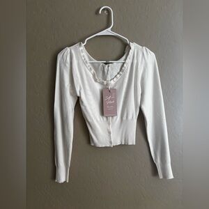 Love tree sweater 
New with tags size medium